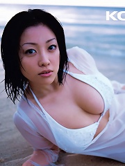 Short haired asian model with soft subtle breasts in a bikini